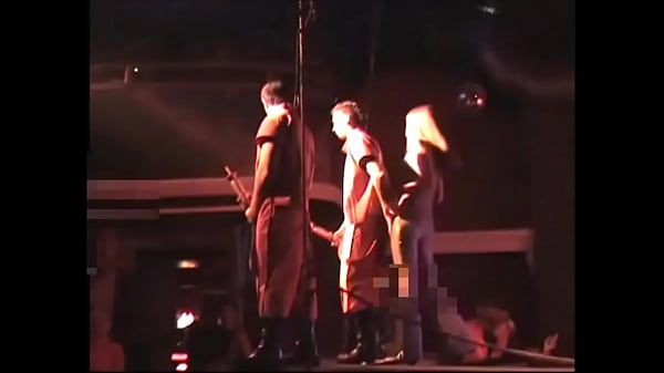 Helga naked  on the stage in front of the public