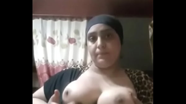 An Egyptian woman is playing with her tits and it is very hot